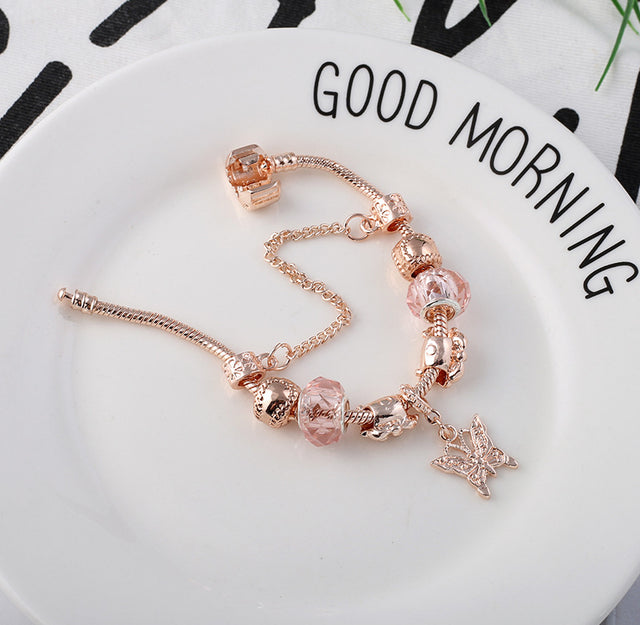 Geometric heart bracelet in rose gold on white background