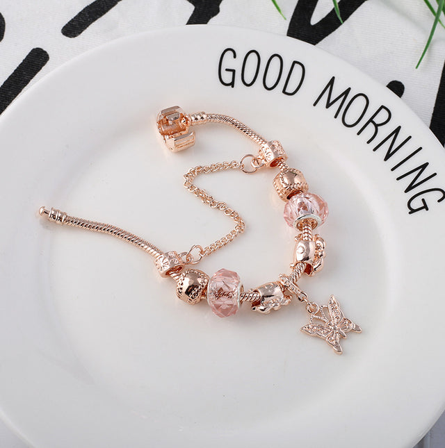 Geometric heart bracelet in rose gold on white background